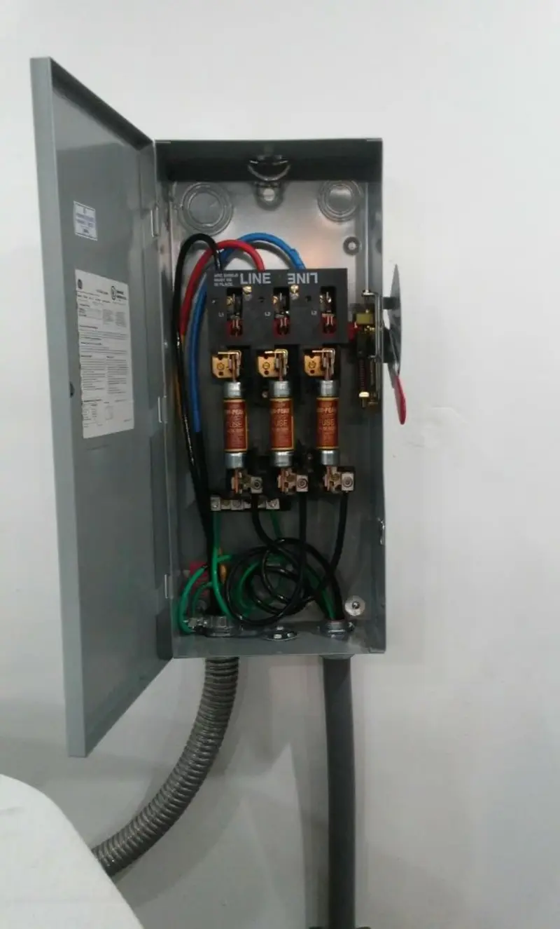 Three-phase disconnect switch installed for Smoke Detector Installation in New London